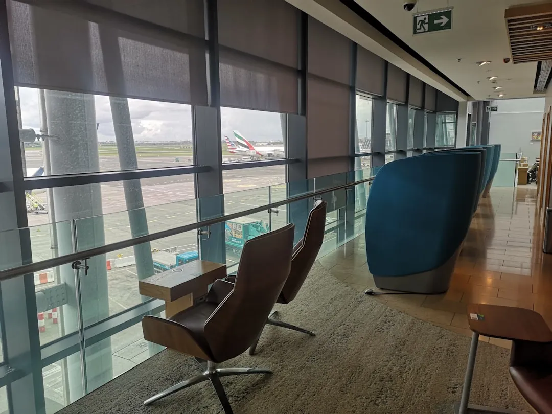 Elegant airport lounge with seating and runway view