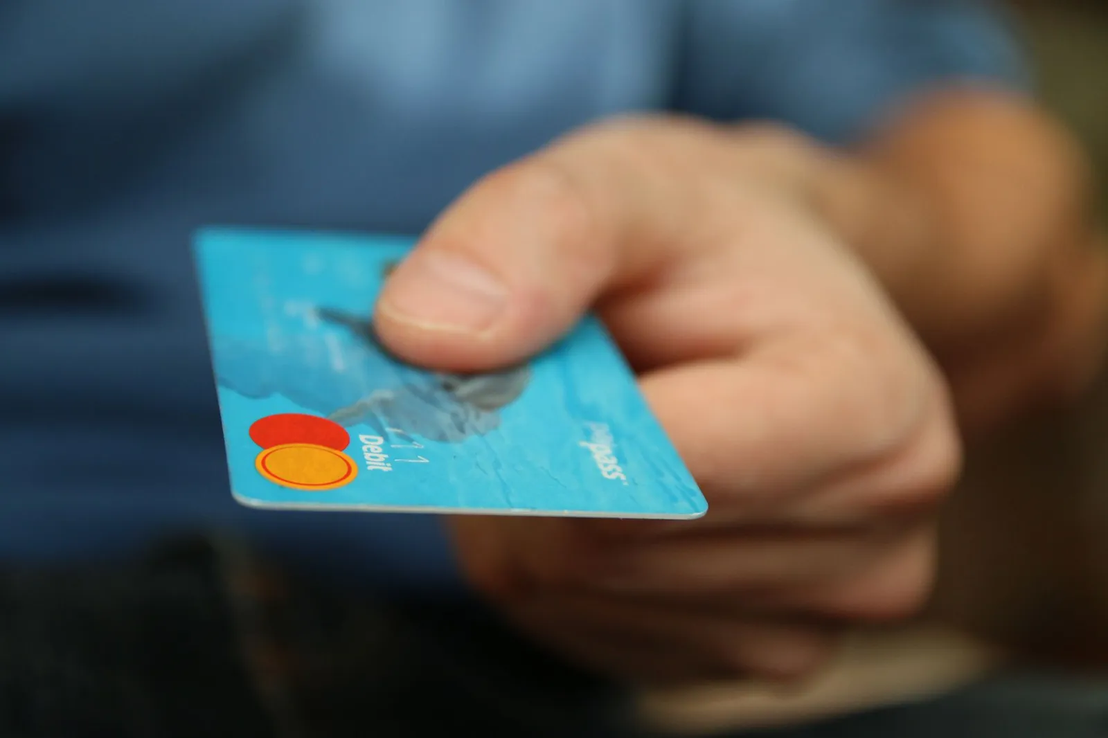 Two credit cards positioned to show the concept of balance transfer between accounts
