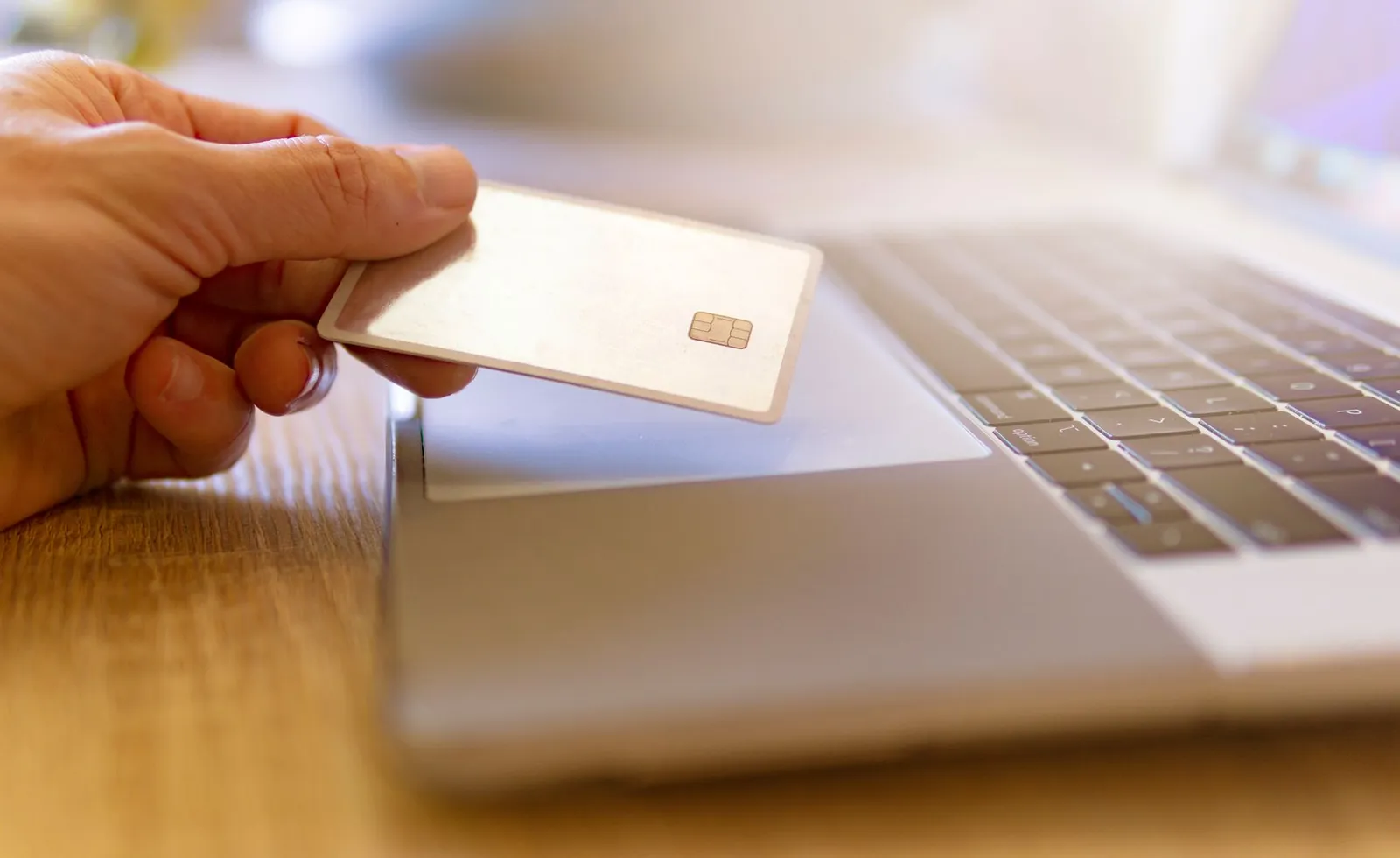 Comparison of five secured credit cards showing deposit amounts, fees, and credit reporting details