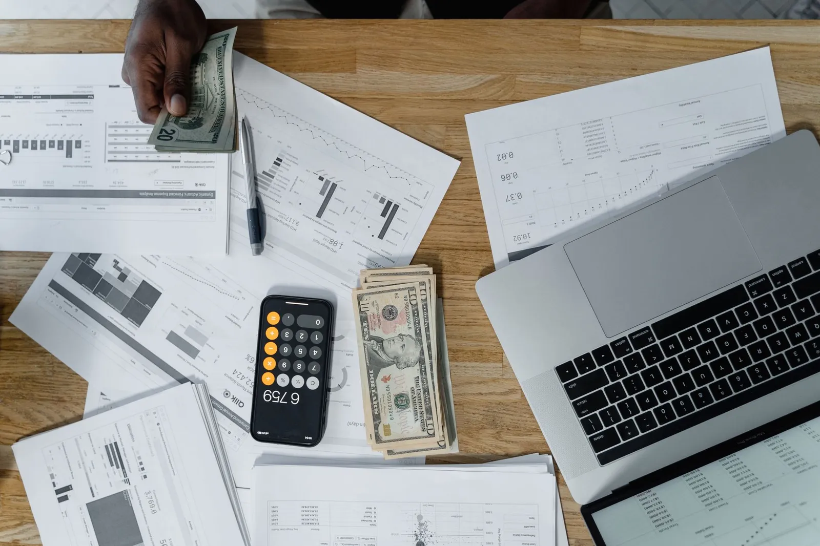 Growing LLC business with visible office supplies, internet equipment, and operational expenses