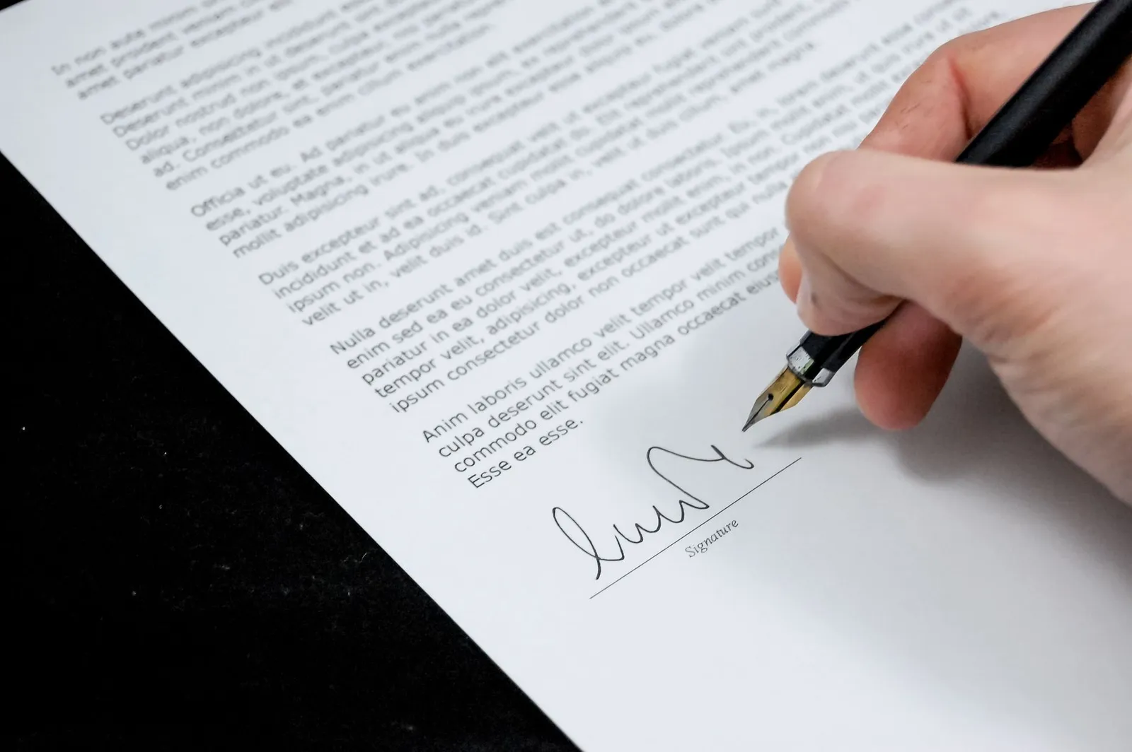 Signed contract document showing personal guarantee clause details